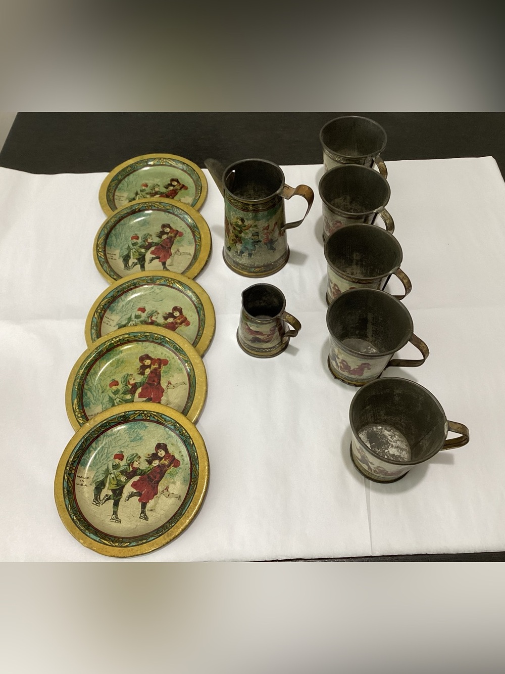 Antique Child’s Toy Tea Set made of Lithographed tin. Made in the U.S.A.